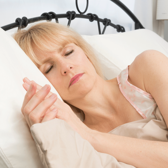 lady asleep on adjustable bed